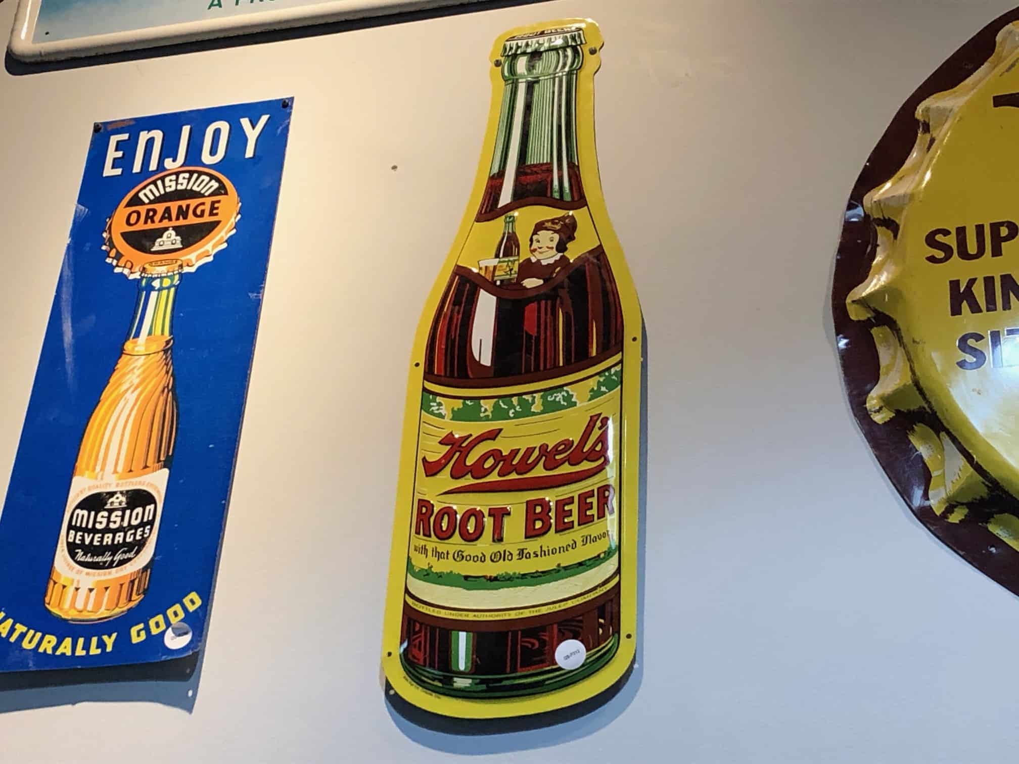 Howell's Root Beer Tin Sign