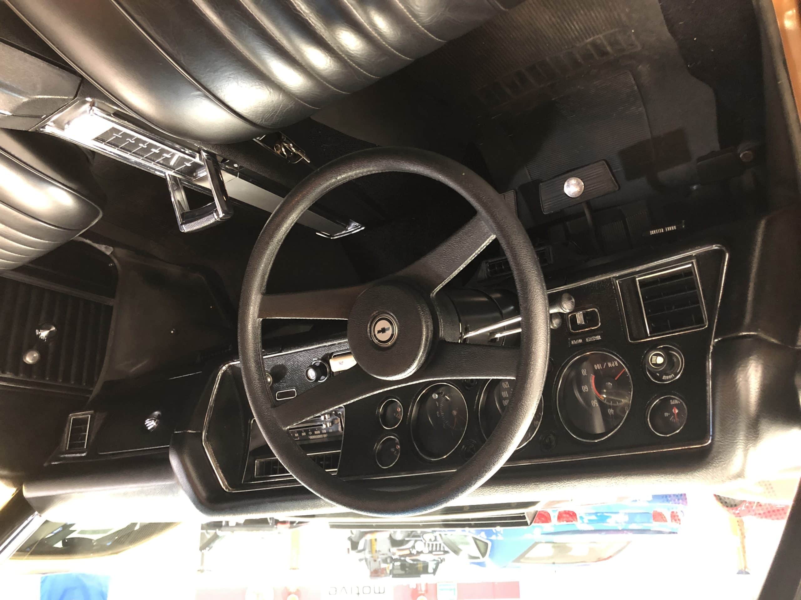 Let’s See.  Rally Gauges, Factory Tach, Center Console, Bucket Seats, Basket Handle Floor Shifter, And Yes, An 8-Track Player With A Zeppelin Tape.